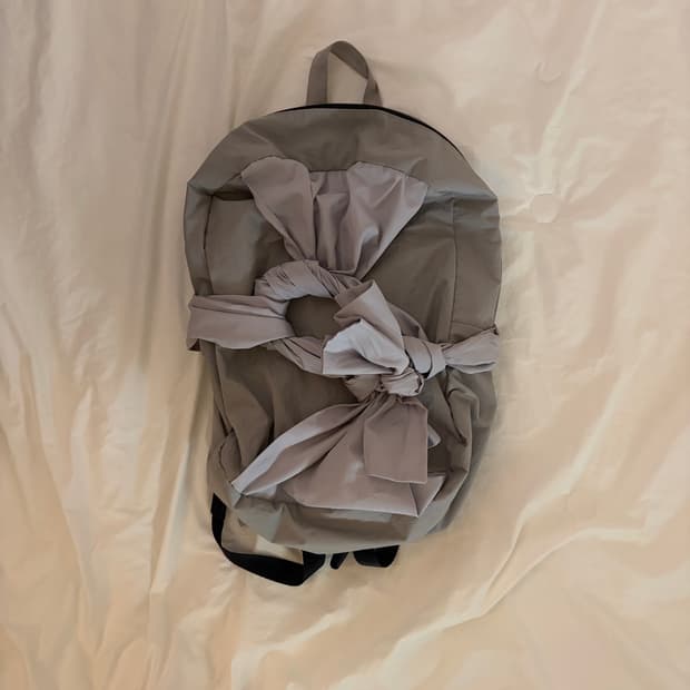 이우가마카라스 노티드 백팩