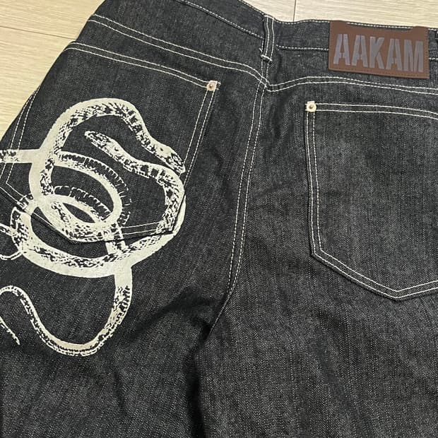 아캄 Snake Printed Denim Pants