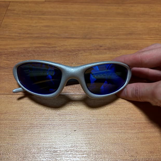 오클리 뉴스트레이트 자켓 새렌즈 실버