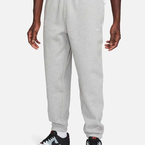 나이키 남성용 SOLO SWOOSH FLEECE 조거 팬츠
