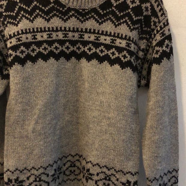 스투시 패턴 니트 스웨터