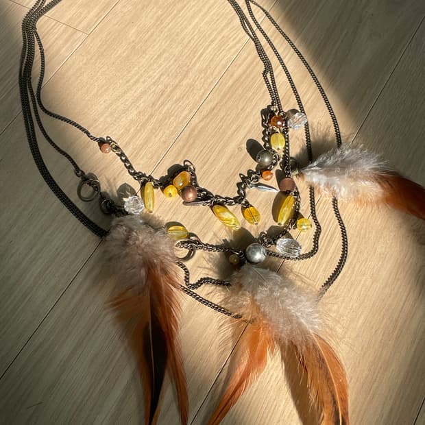 Vintage brown feather 4 string necklace