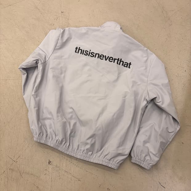 디스이즈네버댓 빅로고 그레이 바람막이