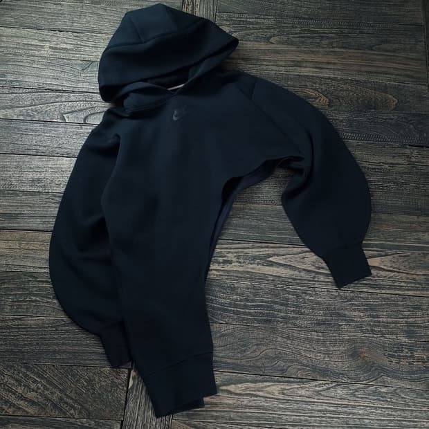 [나이키] 로고 프린팅 언발란스 오버핏 후드티 M18123