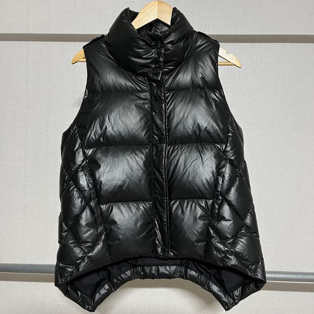 Tess Giberson 검정색 패딩 조끼