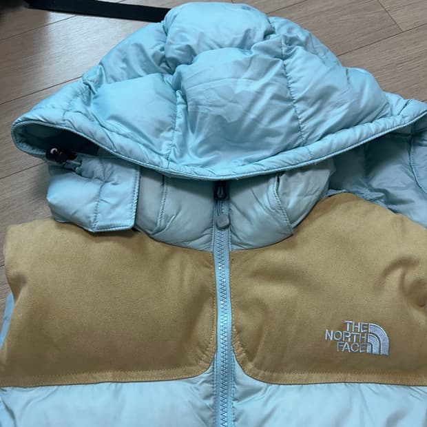 노스페이스 대장템 희귀템 패딩조끼 하늘색 시나모롤