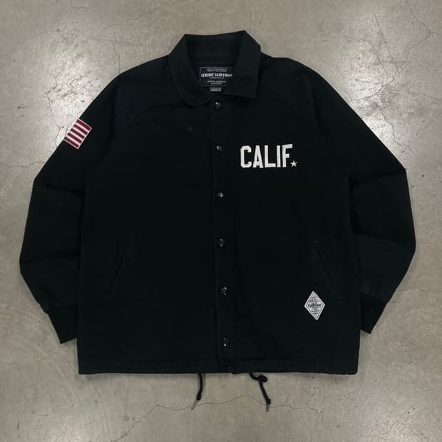 세인트페인 블랙 컬러 성조기 로고 코튼 코치 자켓