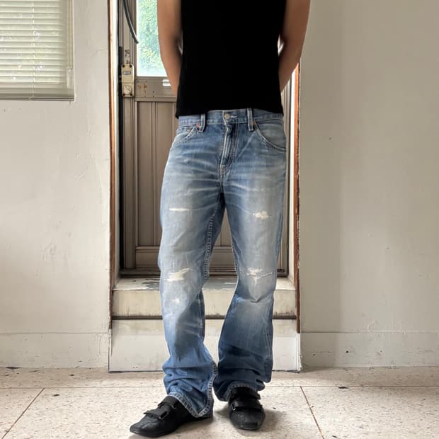 Levi’s 501 빈티지 디스트로이드 데님 팬츠