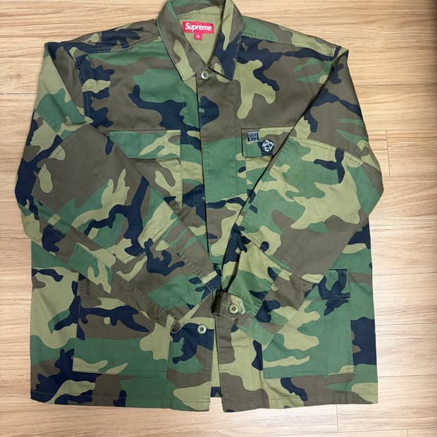 슈프림 x 멜빈스 BDU 자켓 우드랜드 카모 - 24SS