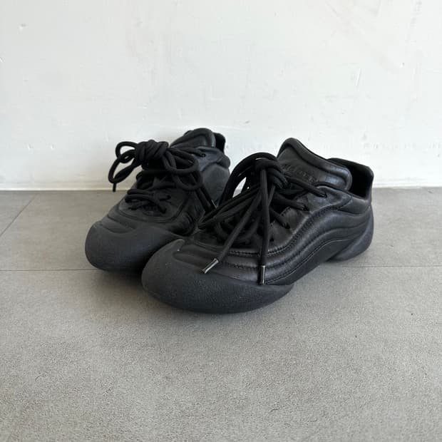 알렉산더 맥퀸 플렉션 테크 레더 블랙