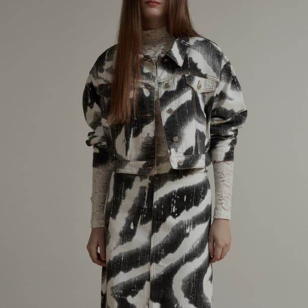솔티페블 ZEBRA PRINTING DENIM SKIRT [BLACK]