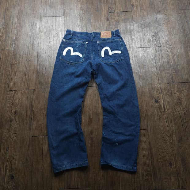 에비수 아카이브 백 자수 시그니처 데님 팬츠