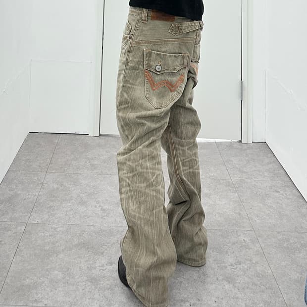 EDWIN flare back strap denim pants