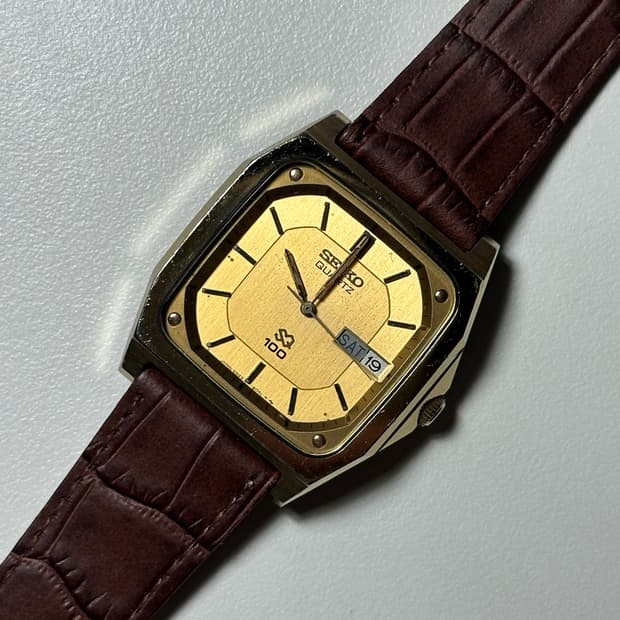 SEIKO SQ100 gold