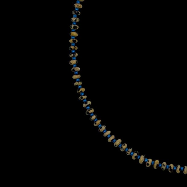 Stones on blue necklace 