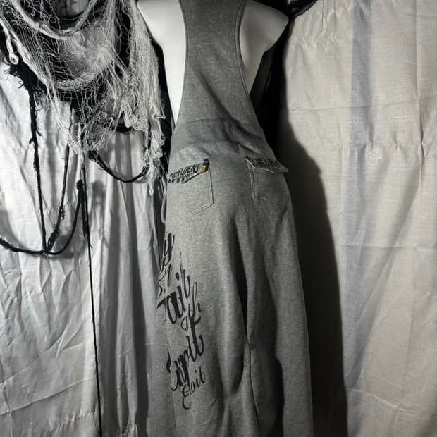 "Unknown" Y2K Lettering Stud Detail Over