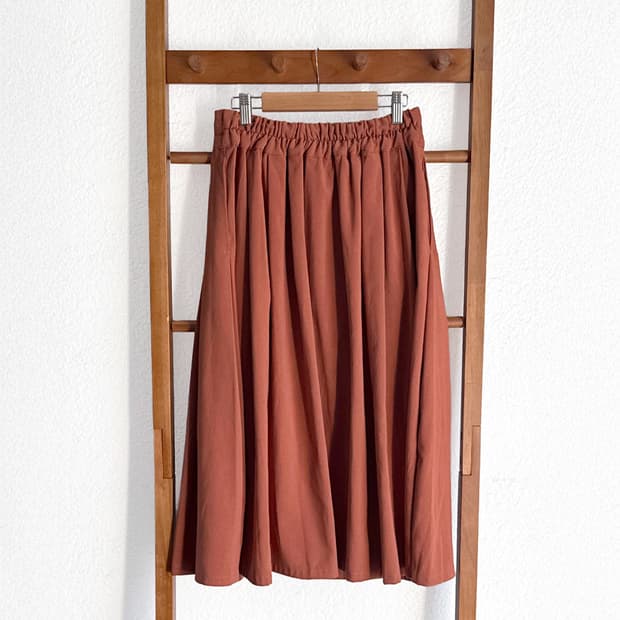 브릭 오렌지 플레어 스커트