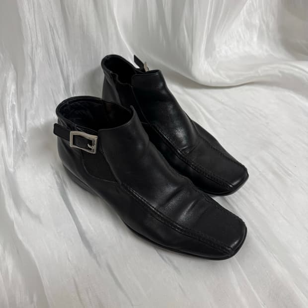 Prada sports buckle leather boots