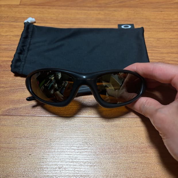 오클리 뉴스트레이트 자켓 브론즈 블랙