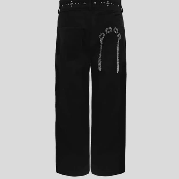 오도어 크리스 스터드 팬츠