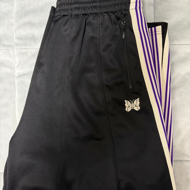 니들스 HD 트랙팬츠 블랙