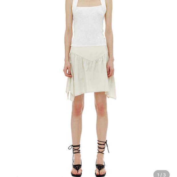 세릭 ASYMMETRIC INCISION SKIRT 언밸런스 스커트