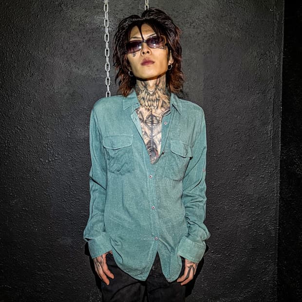 G.O.A – turquoise colored shirt