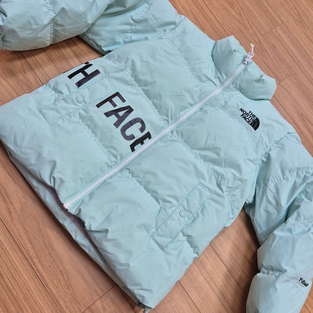 노스페이스 키즈 알칸 티볼 숏패딩 130사이즈입니다. 민트색상 숏패딩이라
