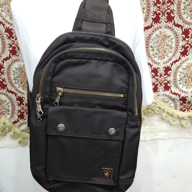 포터 인터내셔날 멜로디 슬링백
​
