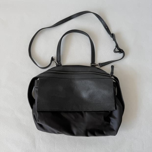 구호(KUHO) 레더&원단 토트 크로스백