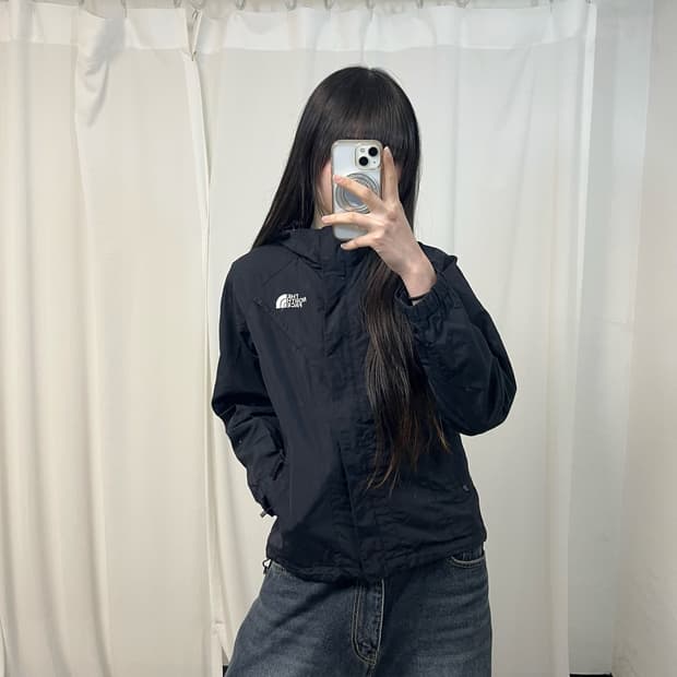 The North Face black windbreaker