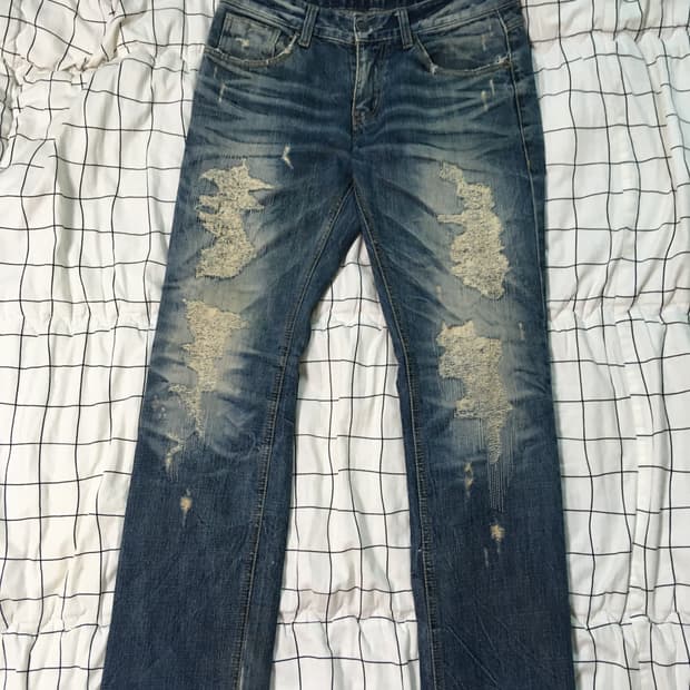 Distressed Heavy-Wash Zippered Jeans