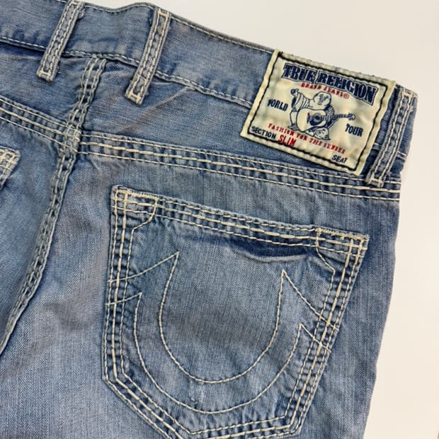 트루릴리젼 슬림 연청 데님 팬츠 