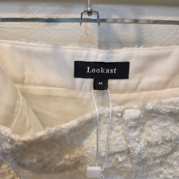 룩캐스트 베니 미디 자가드 스커트 아이보리