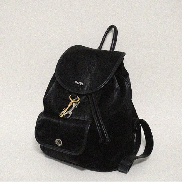 옴니포턴트 레더 백팩