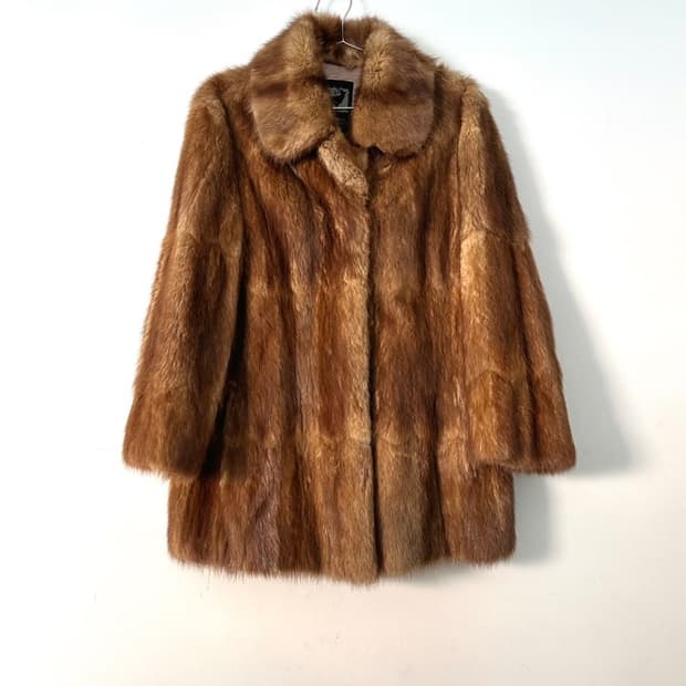 Orange brown muskrat fur jacket