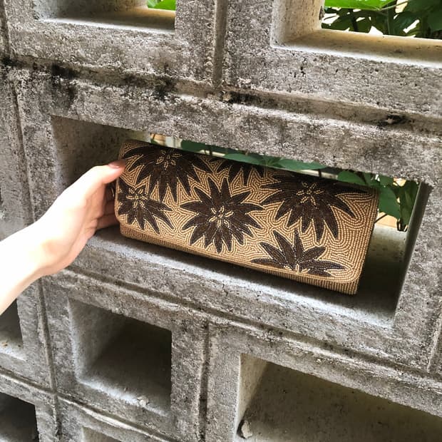 beige floral beaded clutch bag
