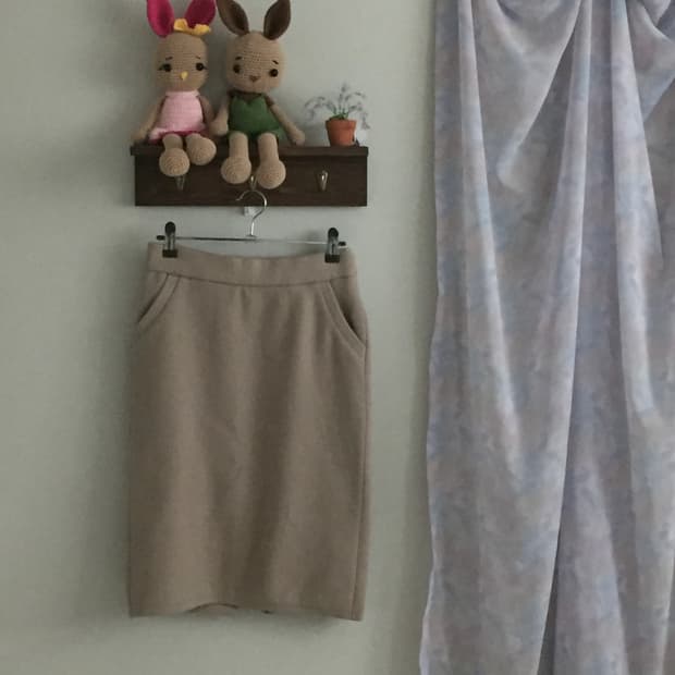 디즈니 베이지 니트 스커트