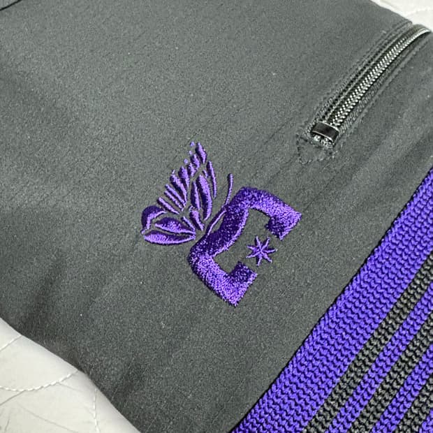 니들스 dc 콜라보 트랙팬츠