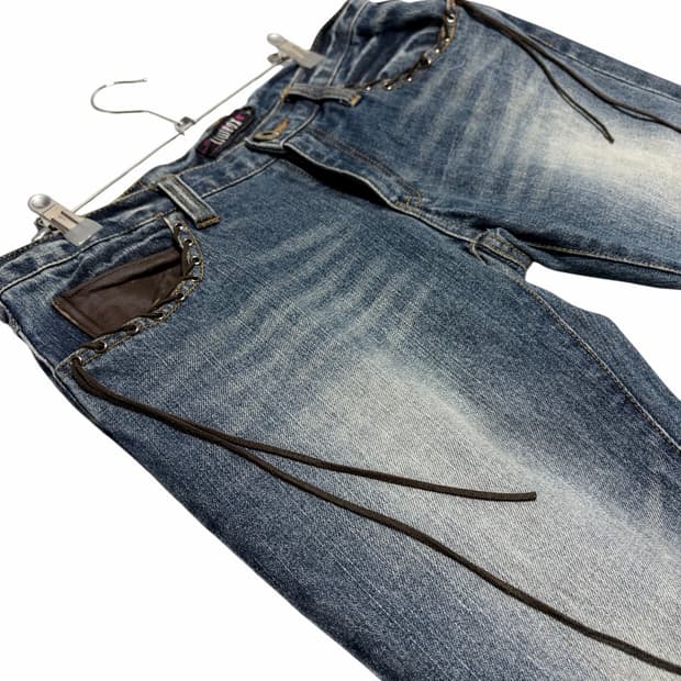 lowbox tassel detail denim pants