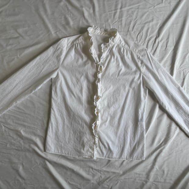 white ruffle blouse