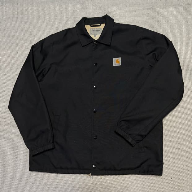 칼하트 WIP 스포츠 코치 자켓 블랙