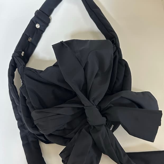 이우가마카라스 노티드 미니 패딩백