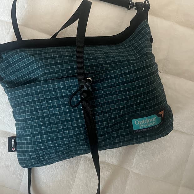 아웃도어 프로덕트 체크 크로스백 