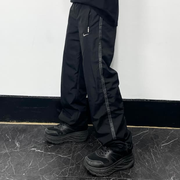 F 나이키 사이드스우시 와이드 조거 트랙팬츠
