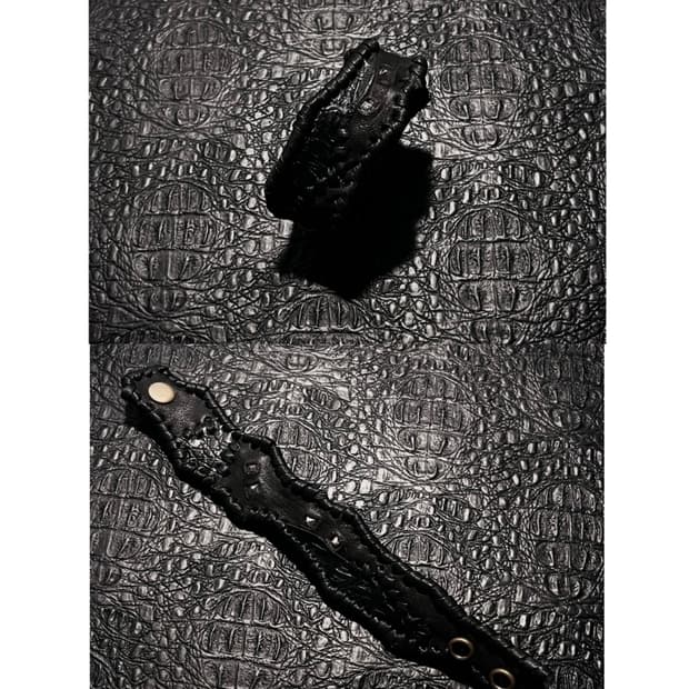a leather bracelet 126