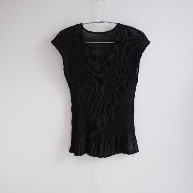 Sheer black accordion pleat sleeveless
