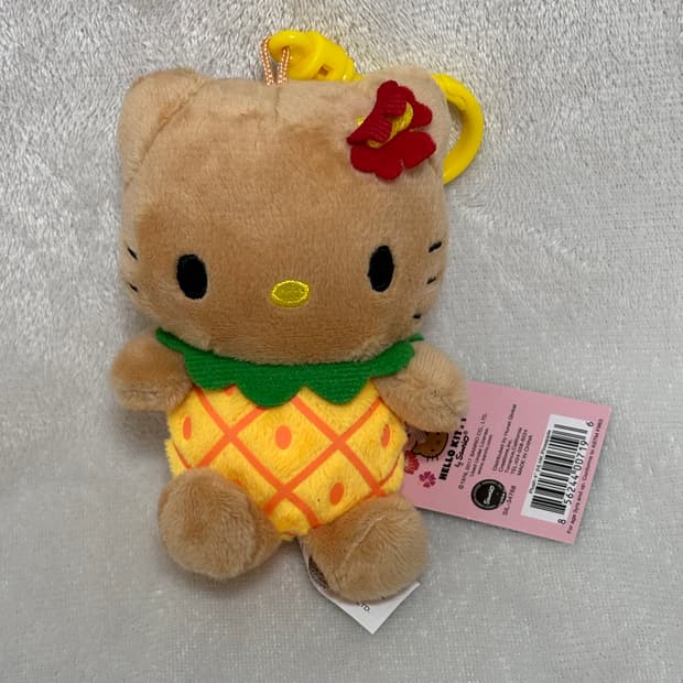 산리오 하와이 정품 파인애플 태닝키티 인형 키링 판매합니다.