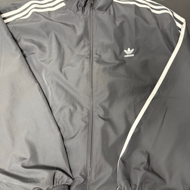 아디다스 아딜레늄 3 오버사이즈 트랙탑 블랙 JD3392