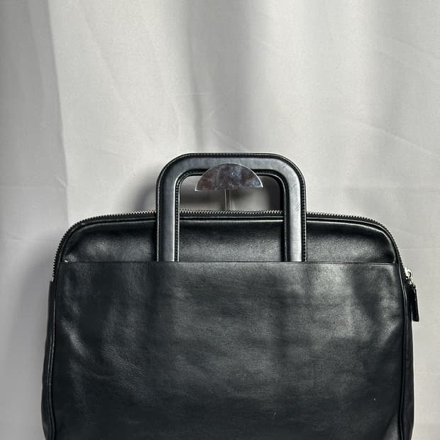 프라다 블랙 카프스킨 슬라이드 핸들 브리프케이스